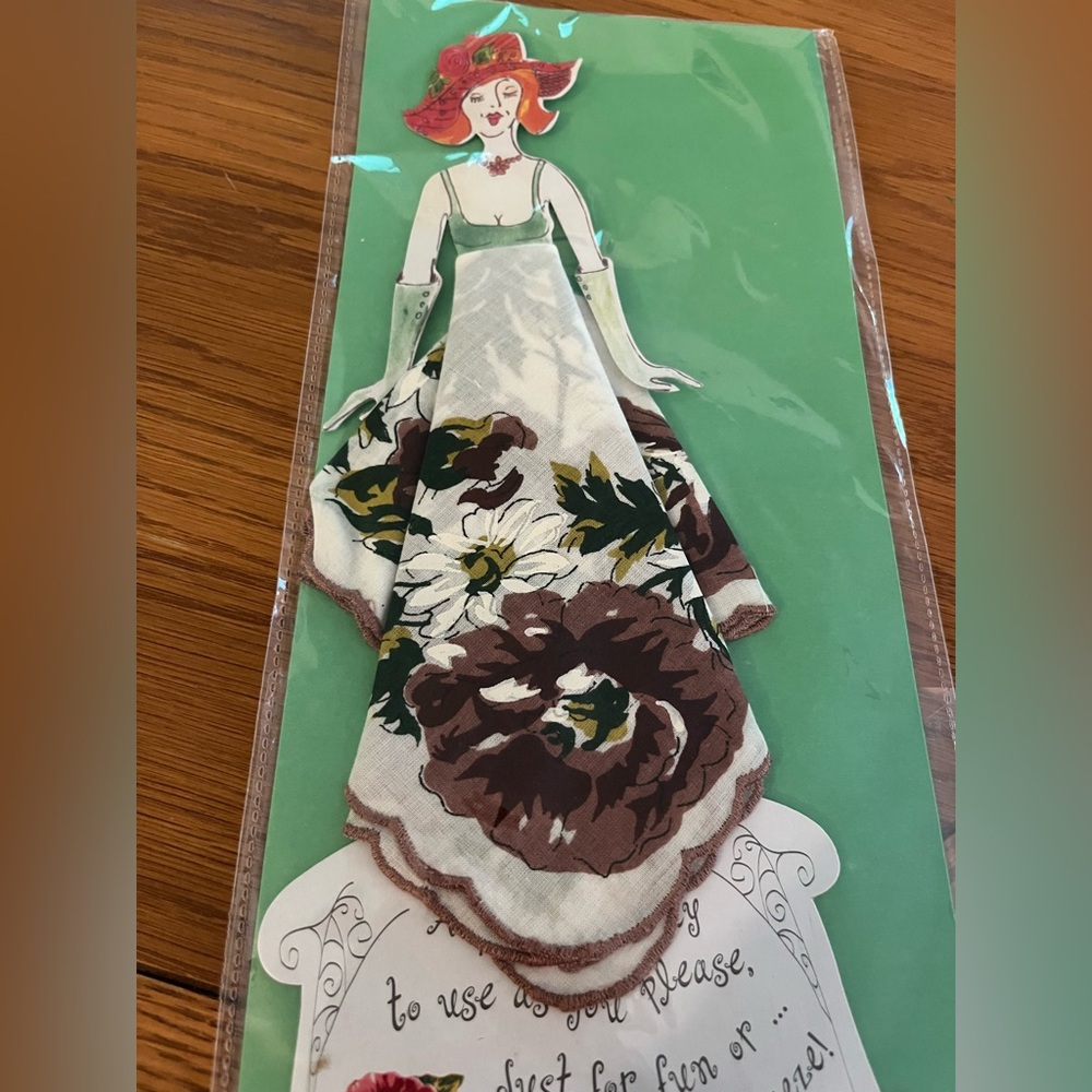 New in package -greeting card with beautiful cotton handkerchief.
